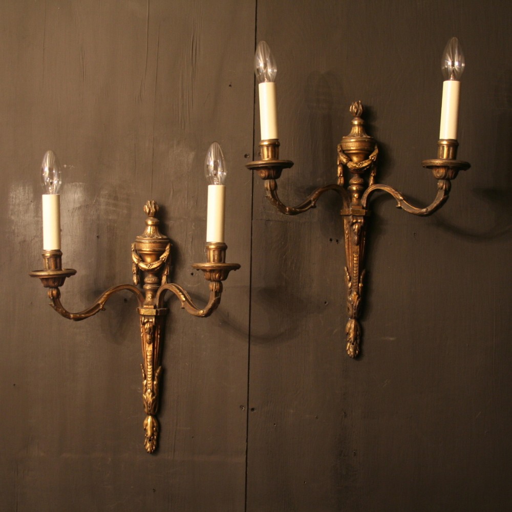 A Large French Pair Of Bronze Cast Antique Twin Arm Wall Lights