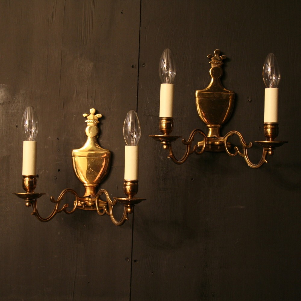 A Flemish Pair Of Cast Brass Twin Arm Antique Sconces