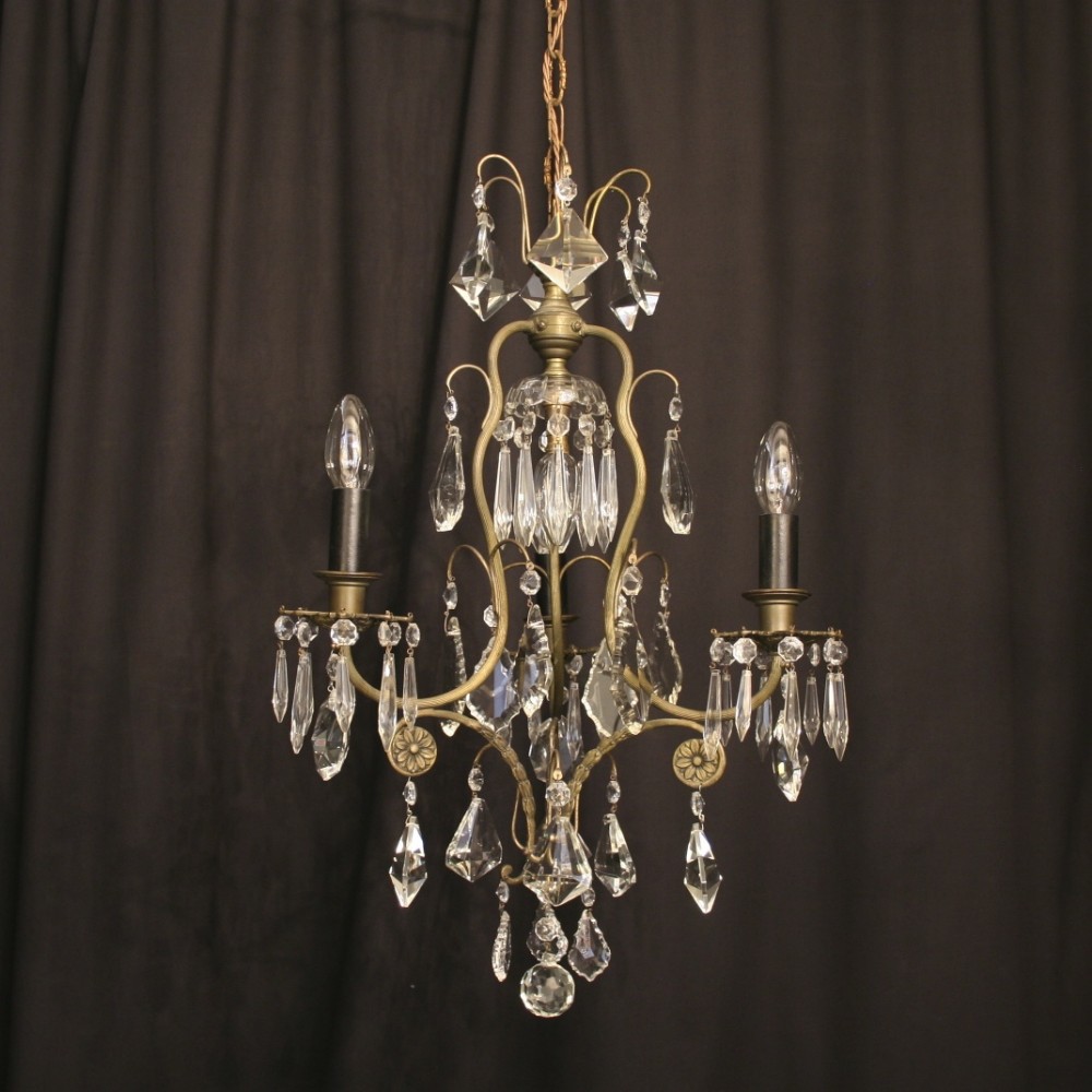 A French Silvered Cast Brass 4 Light Antique Chandelier