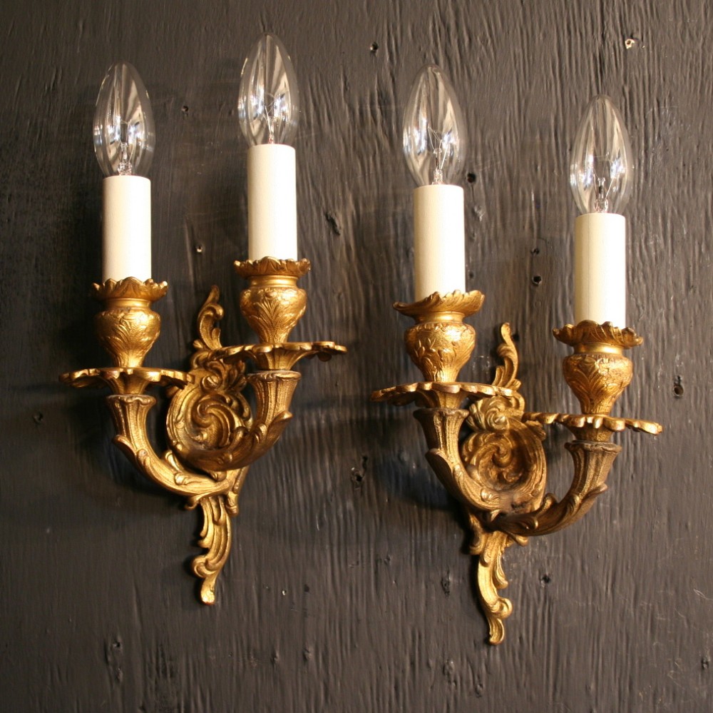 A French Pair Of Gilded Bronze Antique Wall Lights