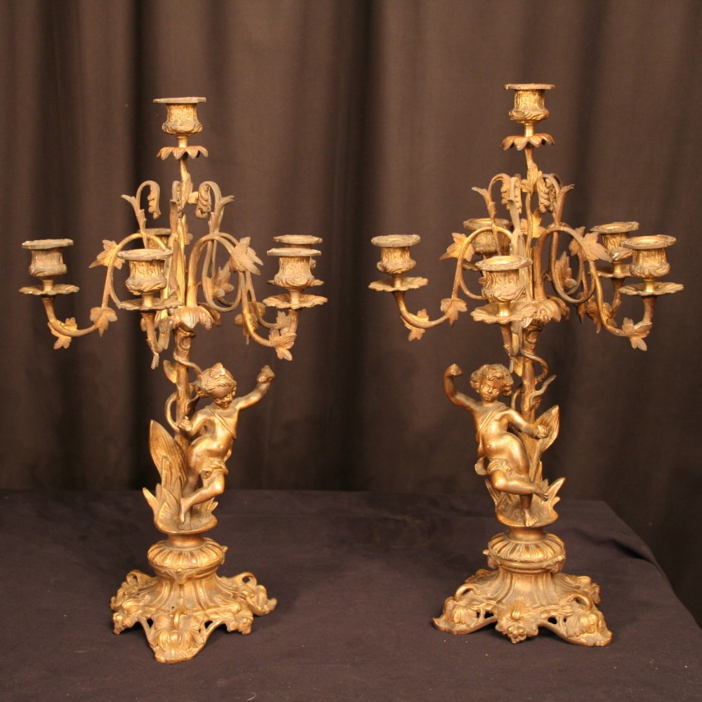 A French Pair Of Bronze Cherub 6 Light Candelabra