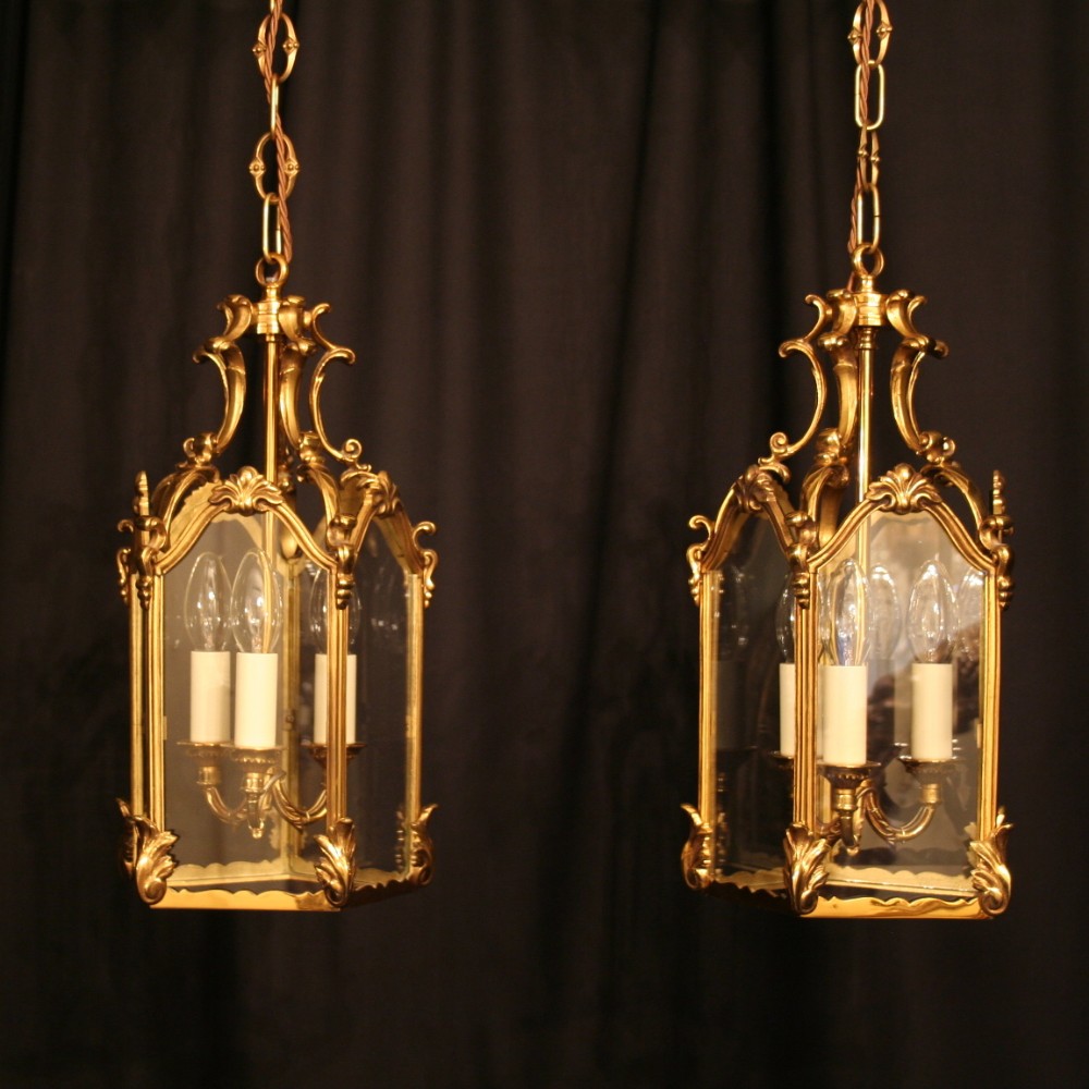 A French Pair Of Triple Light Gilded Bronze Lanterns