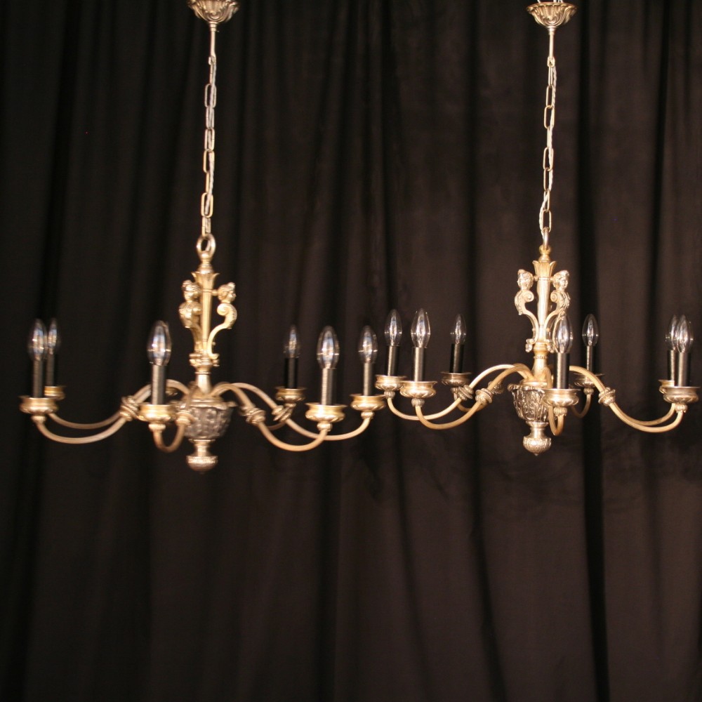 A French Pair Of 7 Light Antique Chandeliers