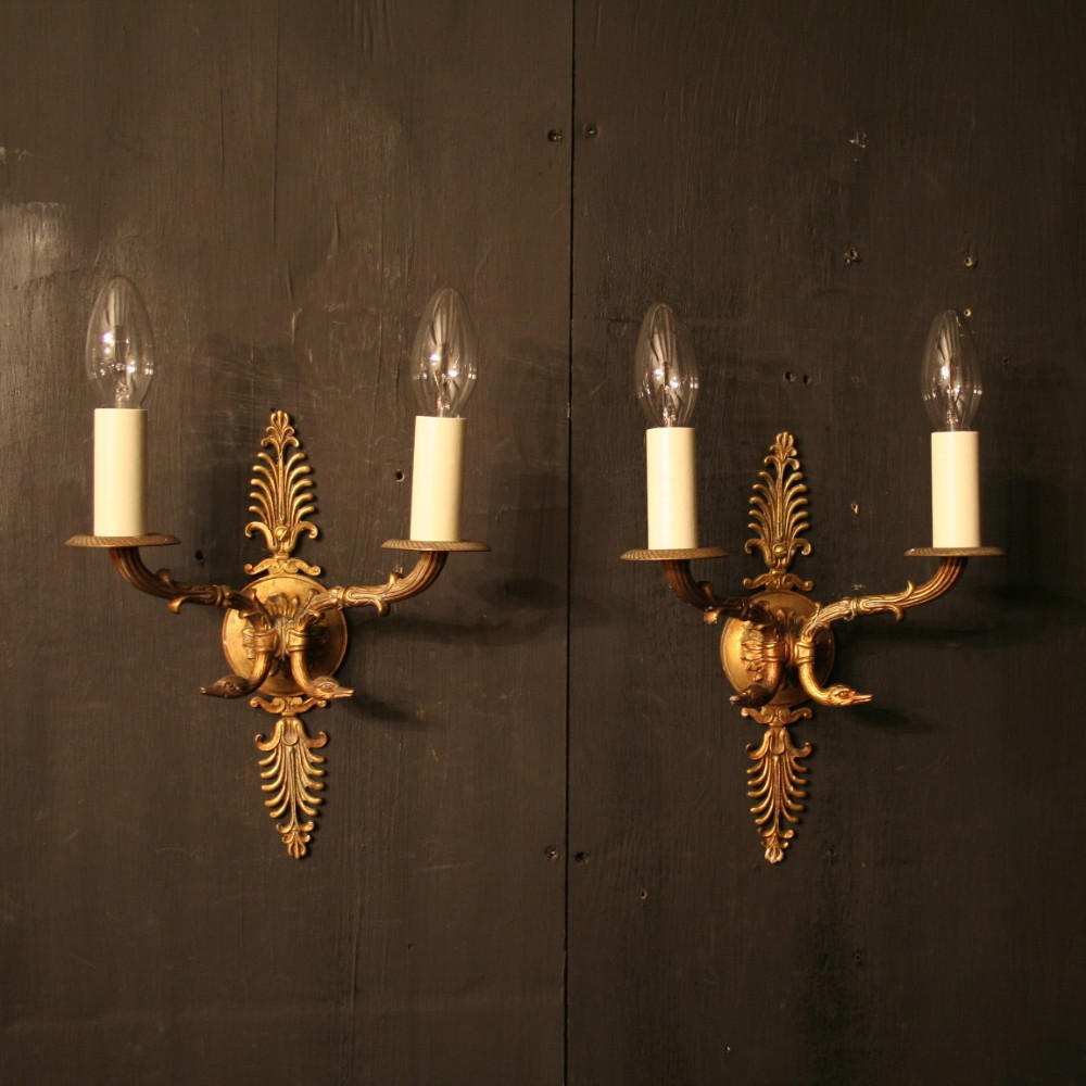 A French Pair Of Gilded Antique Wall Lights