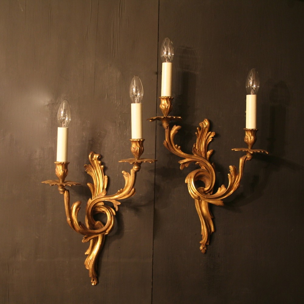 A French Pair Of Gilded Antique Wall Sconces