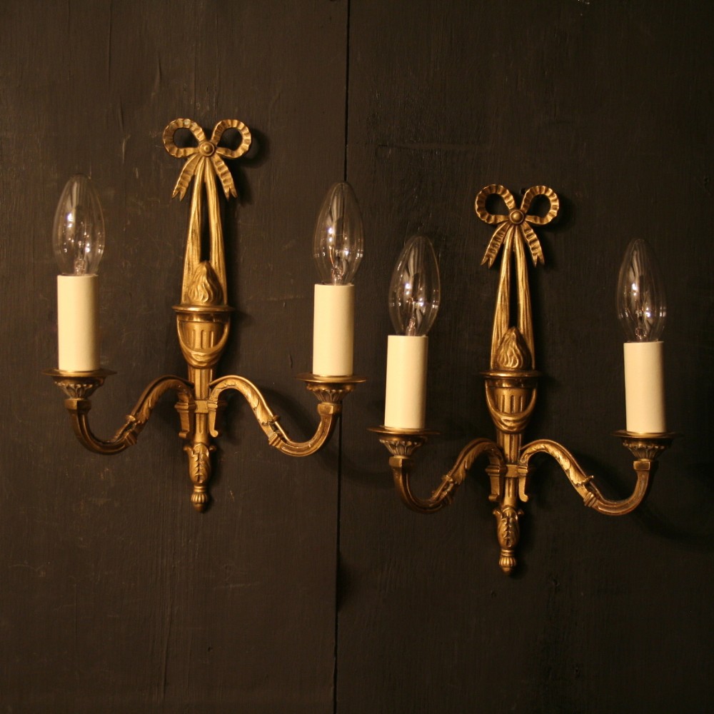 A French Pair Of Gilded Antique Wall Lights