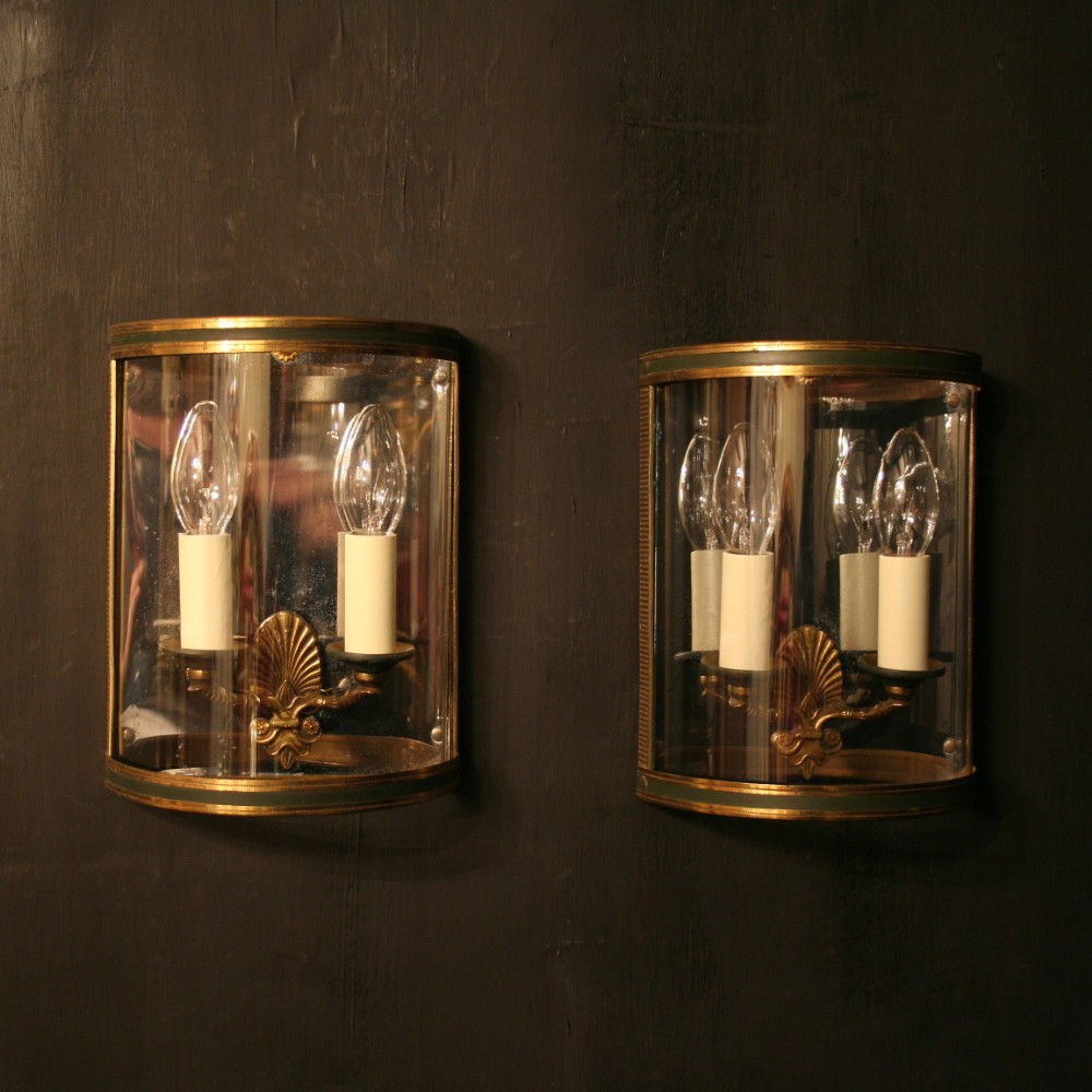 A French Pair Of Gilded Antique Convex Half lanterns