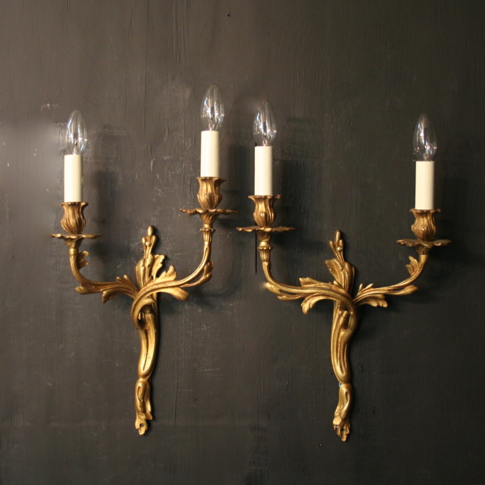 A French Pair Of Gilded Antique Wall Sconces