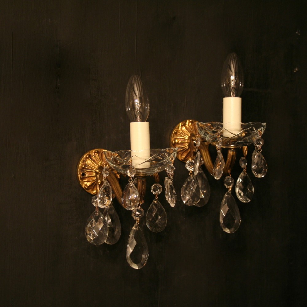 A French Pair Of Gilded Antique Wall Lights