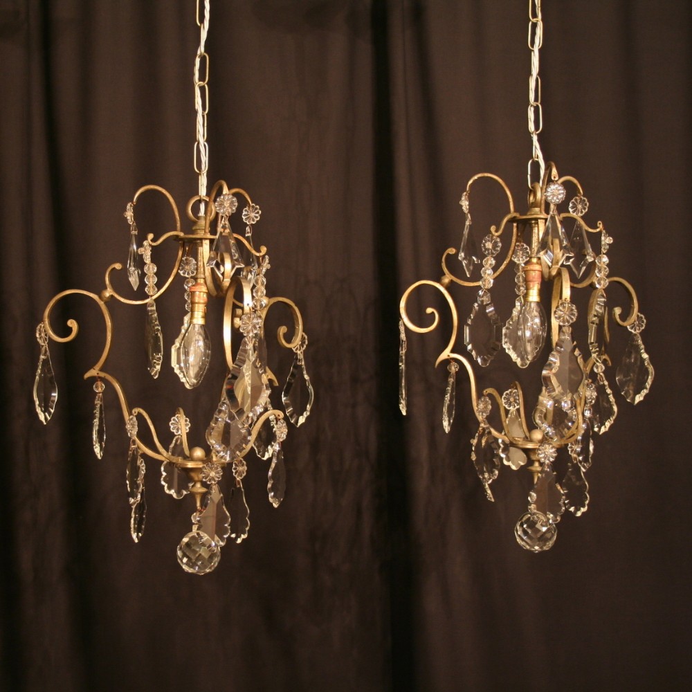A French Pair Of Silver Antique Chandeliers