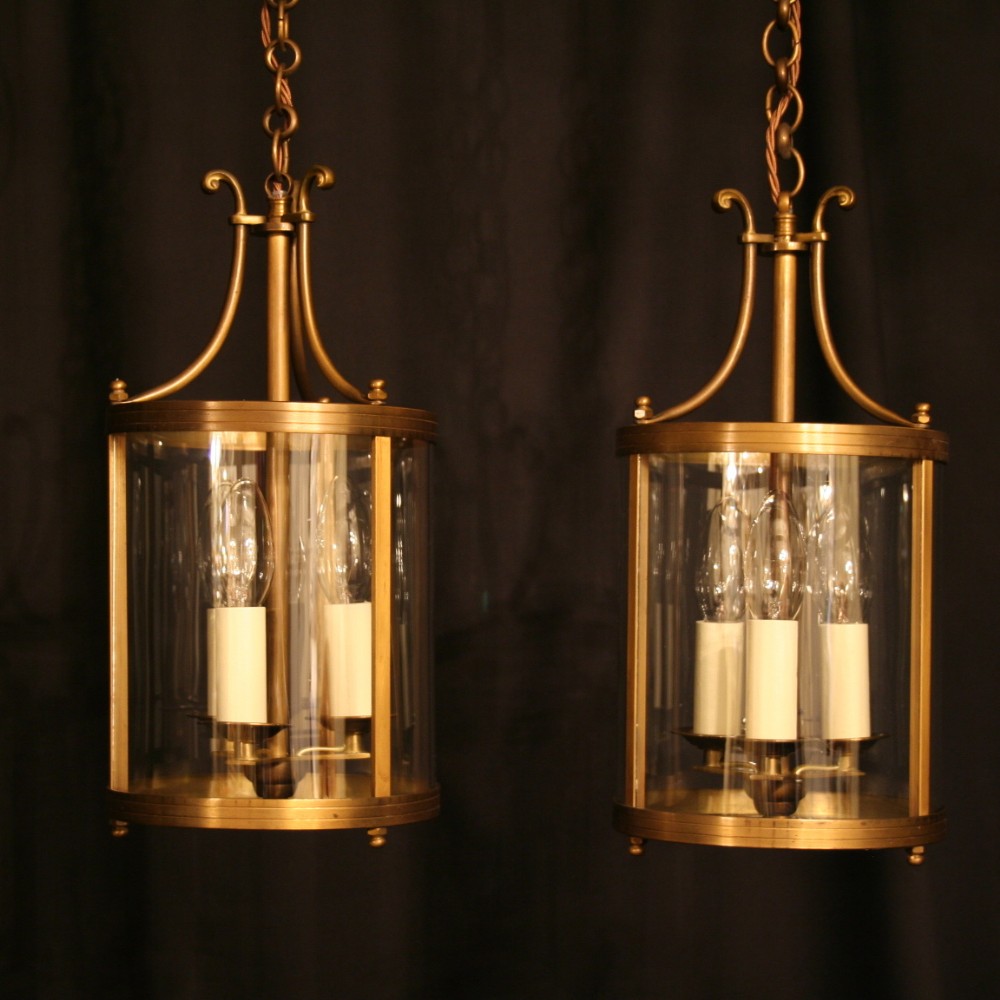 A French Pair Of Brass Convex Hall Lanterns