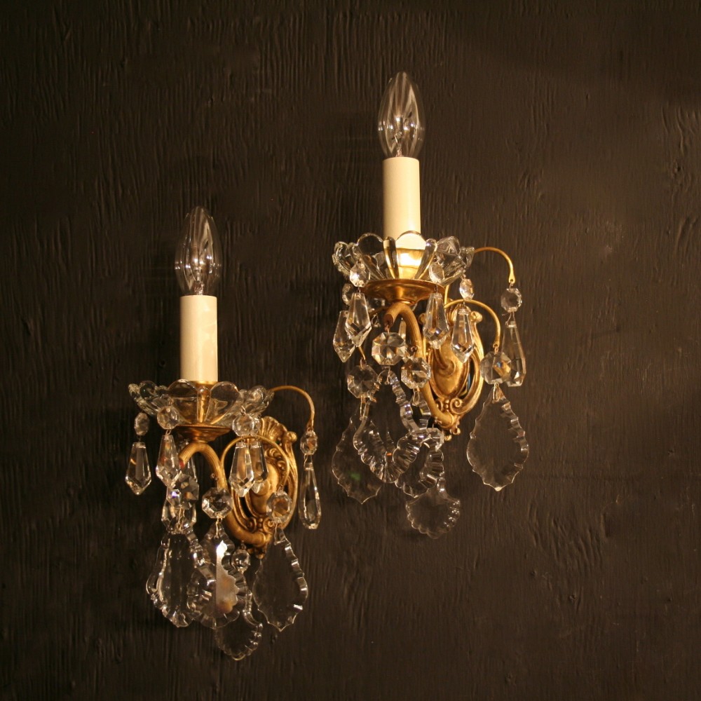 A French Pair Of Gilded Antique Wall Lights