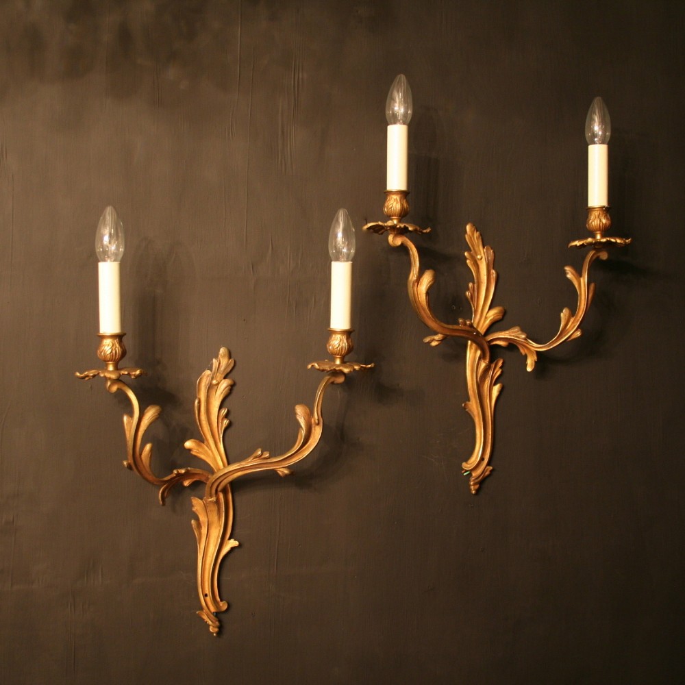 A French Pair Of Gilded Antique Wall Sconces