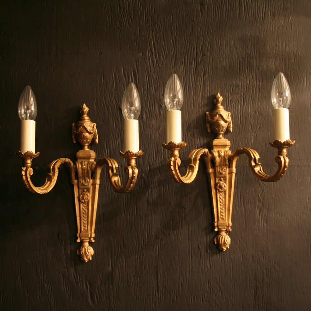 An English Pair Of Bronze Antique Wall Lights