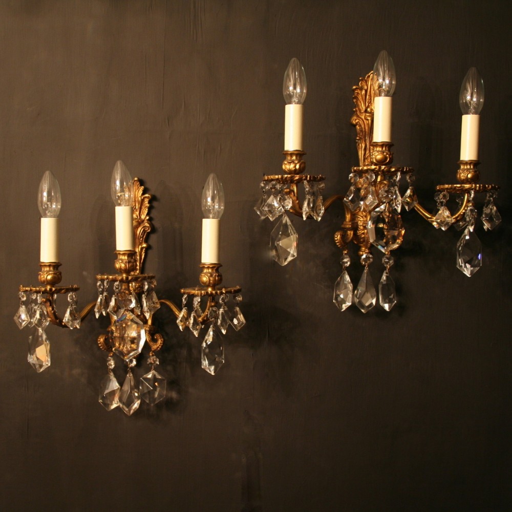 An Italian Pair Of Triple Arm Antique Wall Lights