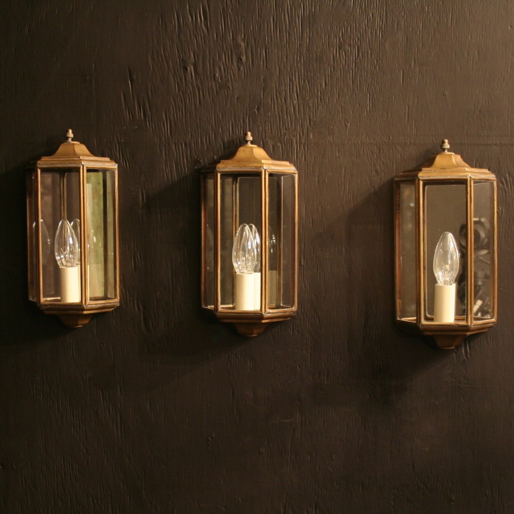 A French Set Of Three Brass Half lanterns