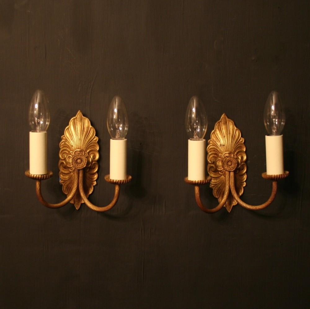 A French Pair Of Gilded Twin Arm Wall Lights
