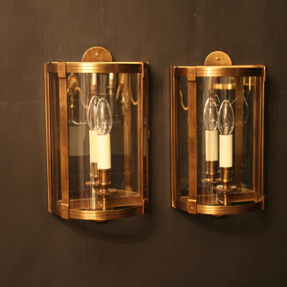 A French Pair Of Bronze Half Wall lanterns
