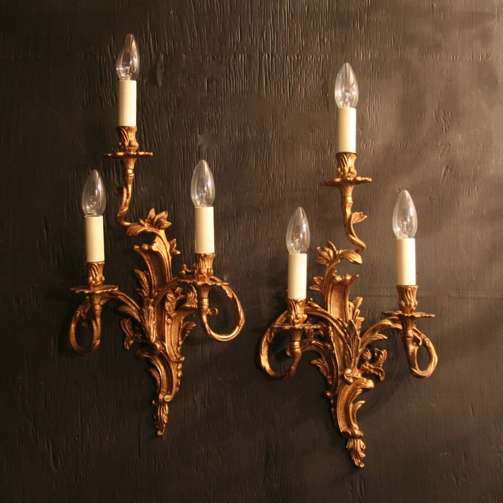 An Italian Pair Of Triple Arm Wall Lights