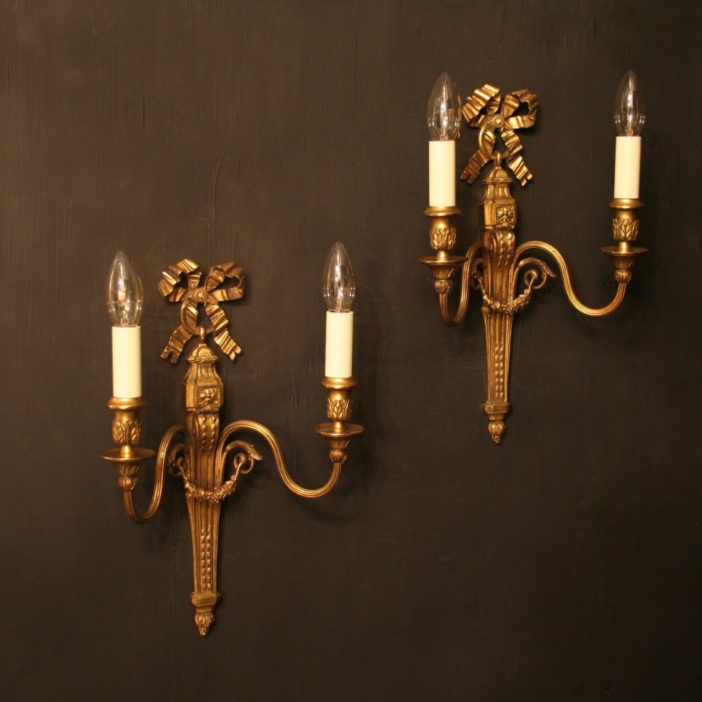 A French Pair Of Gilded Bronze Antique Wall Lights