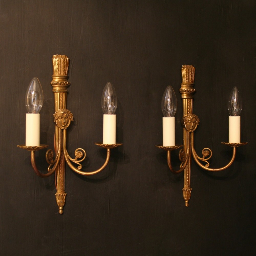 A French Pair Of Gilded Twin Light Antique Wall Lights