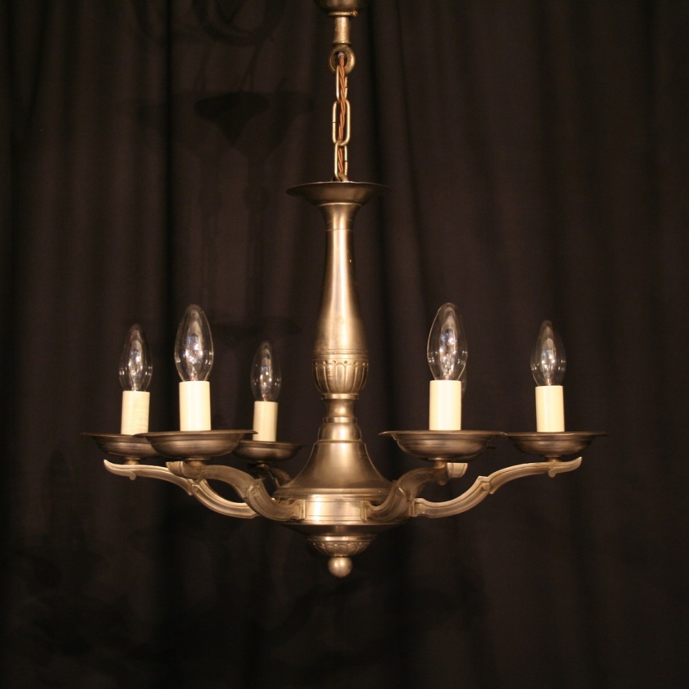 A Flemish Burnished Silver 6 Light Chandelier