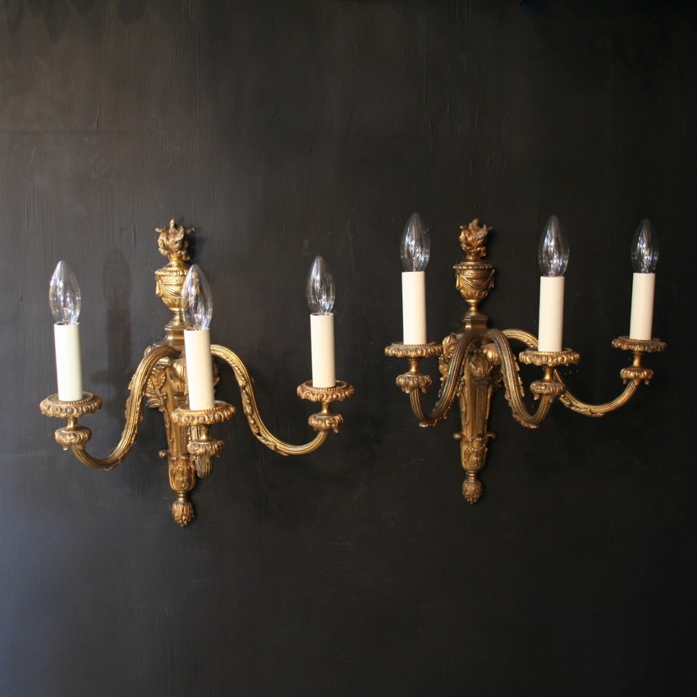 An English Pair Of Bronze Triple Arm Antique Wall Lights