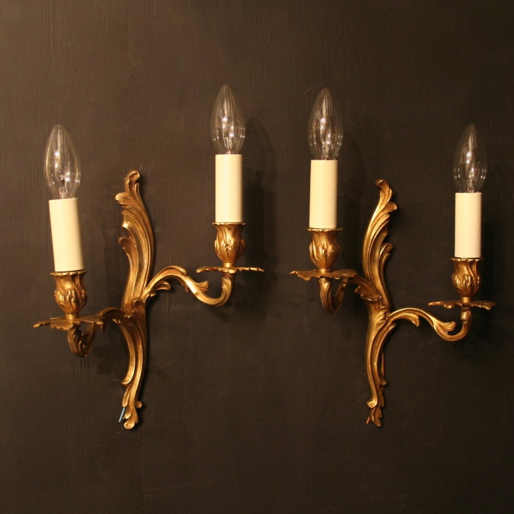 A French Pair Of Gilded Antique Wall Lights