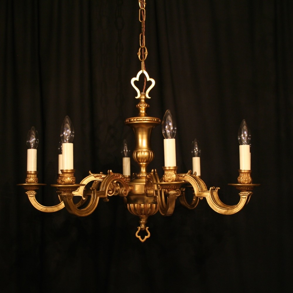A French Gilded Cast Brass 8 Light Chandelier