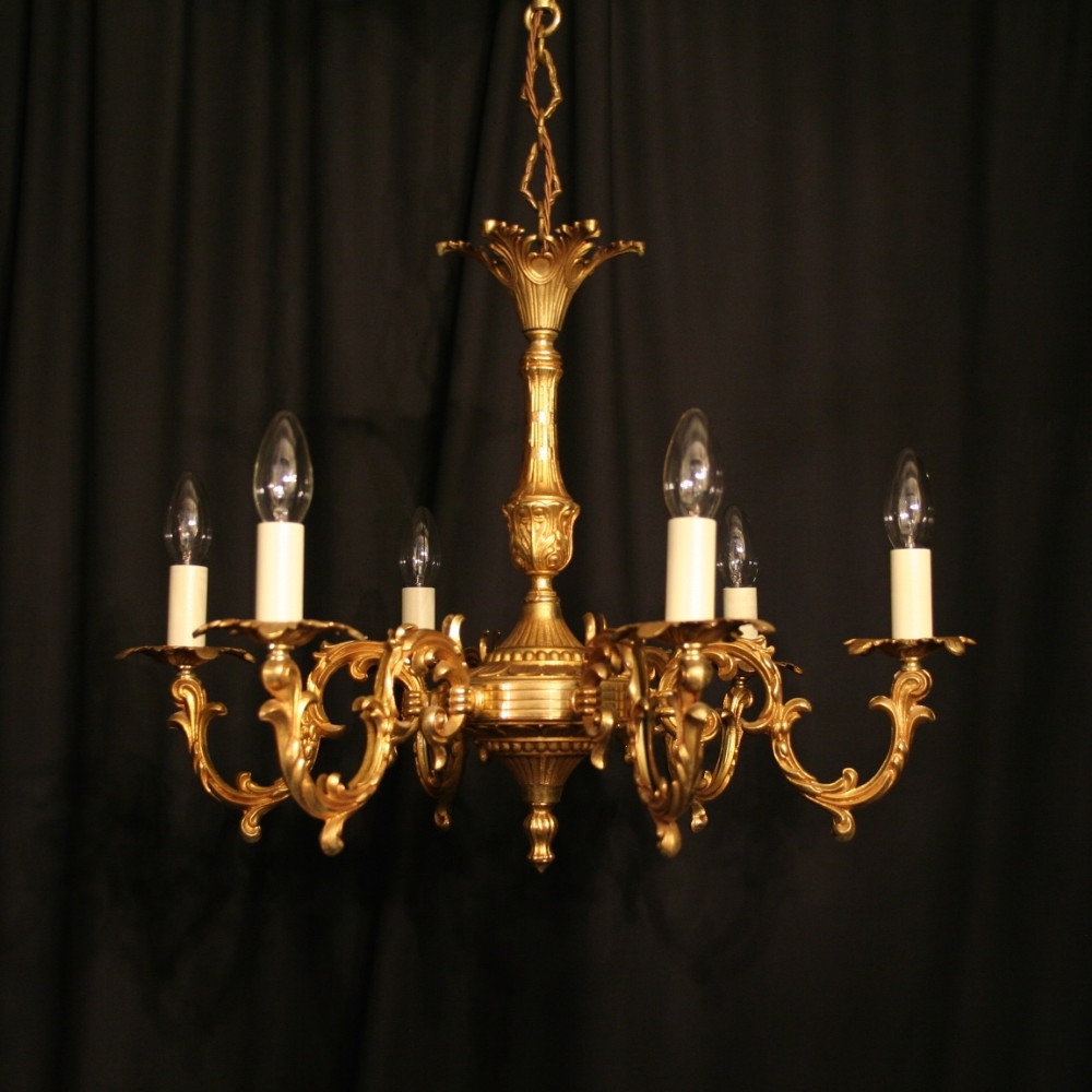 An Ornate French Gilded Cast Brass 6 Light Chandelier