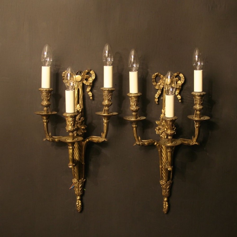 A French Pair Of Bronze Triple Arm Antique Wall Sconces