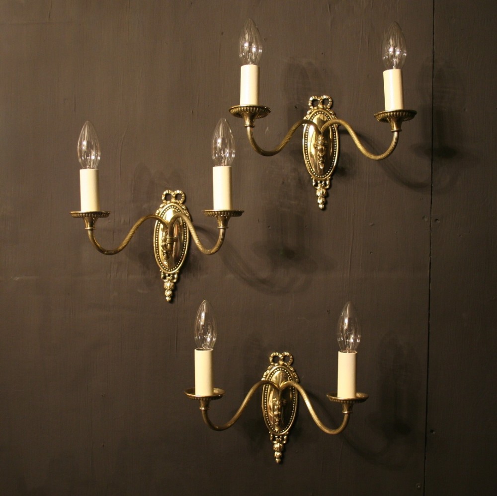An English Set Of Three BrassTwin Arm Antique Wall Lights