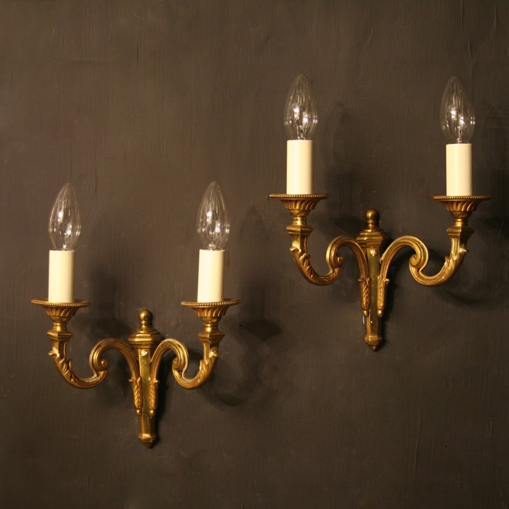 A French Pair Of Gilded Bronze Antique Wall Lights
