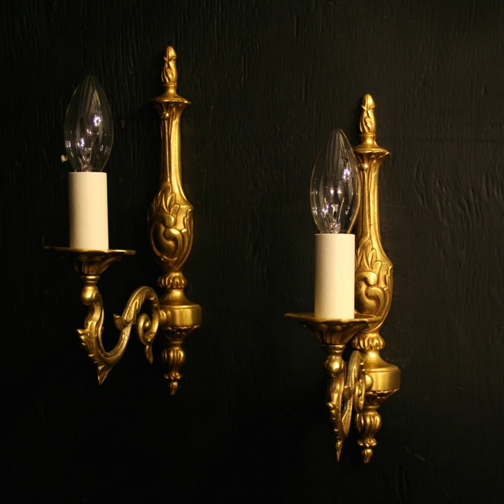A French Pair Of Single Arm Antique Wall Lights
