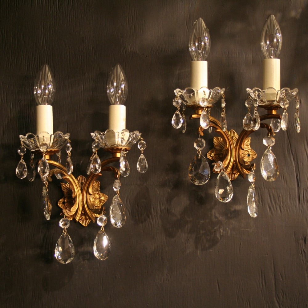 An Italian Pair Of Twin Arm Antique Wall Lights