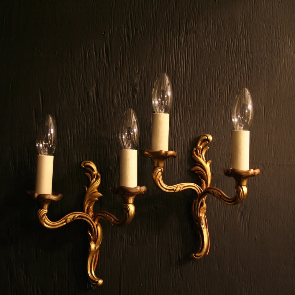 A French Set Of 8 Gilded Twin Arm Antique Wall Lights