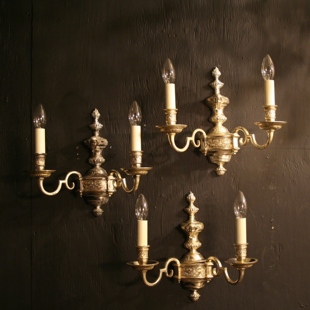 An English Set Of Three Silver Twin Arm Wall Lights