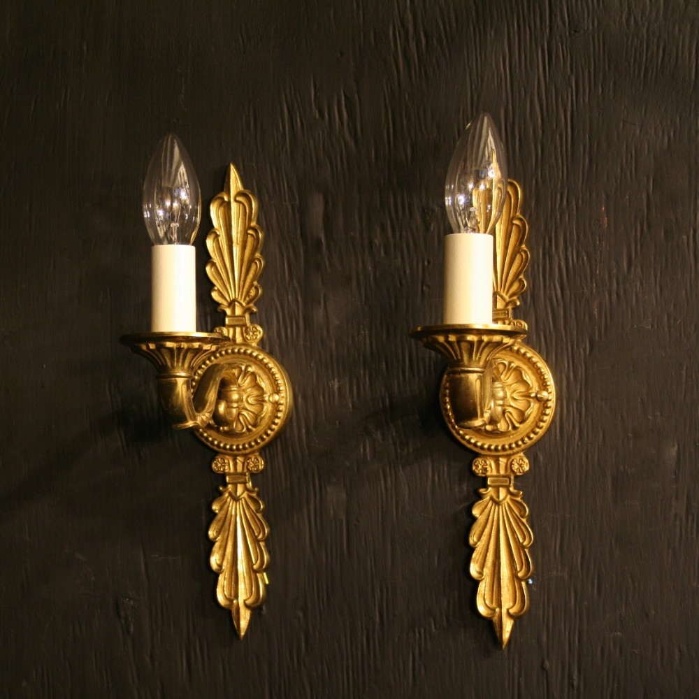 A French Pair Of Single Arm Antique Wall Lights