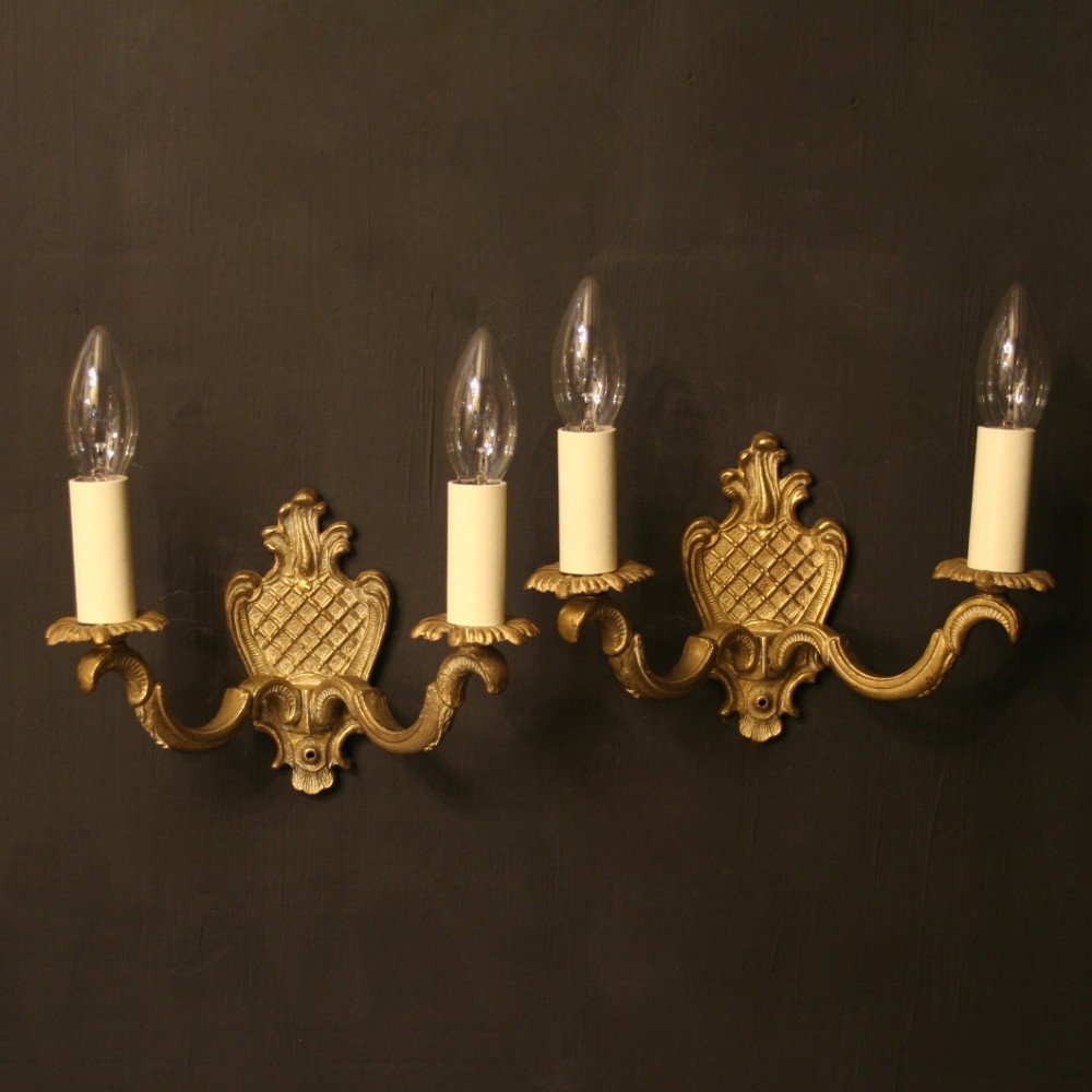 A French Pair Of Bronze Antique Wall Lights