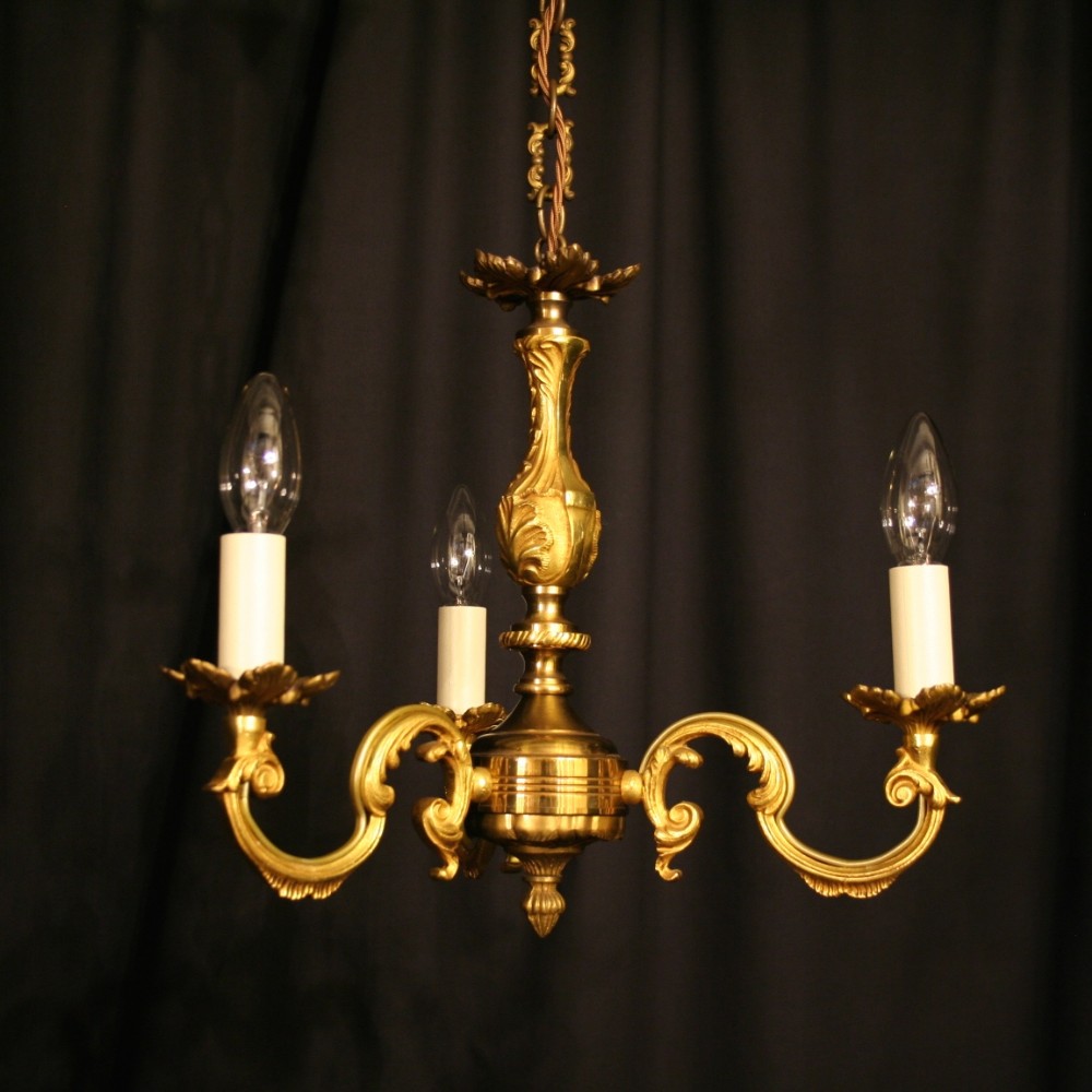 A Small French Gilded Triple Light Chandelier