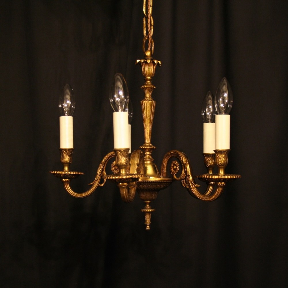 A French Ornate Gilded 5 Light Chandelier