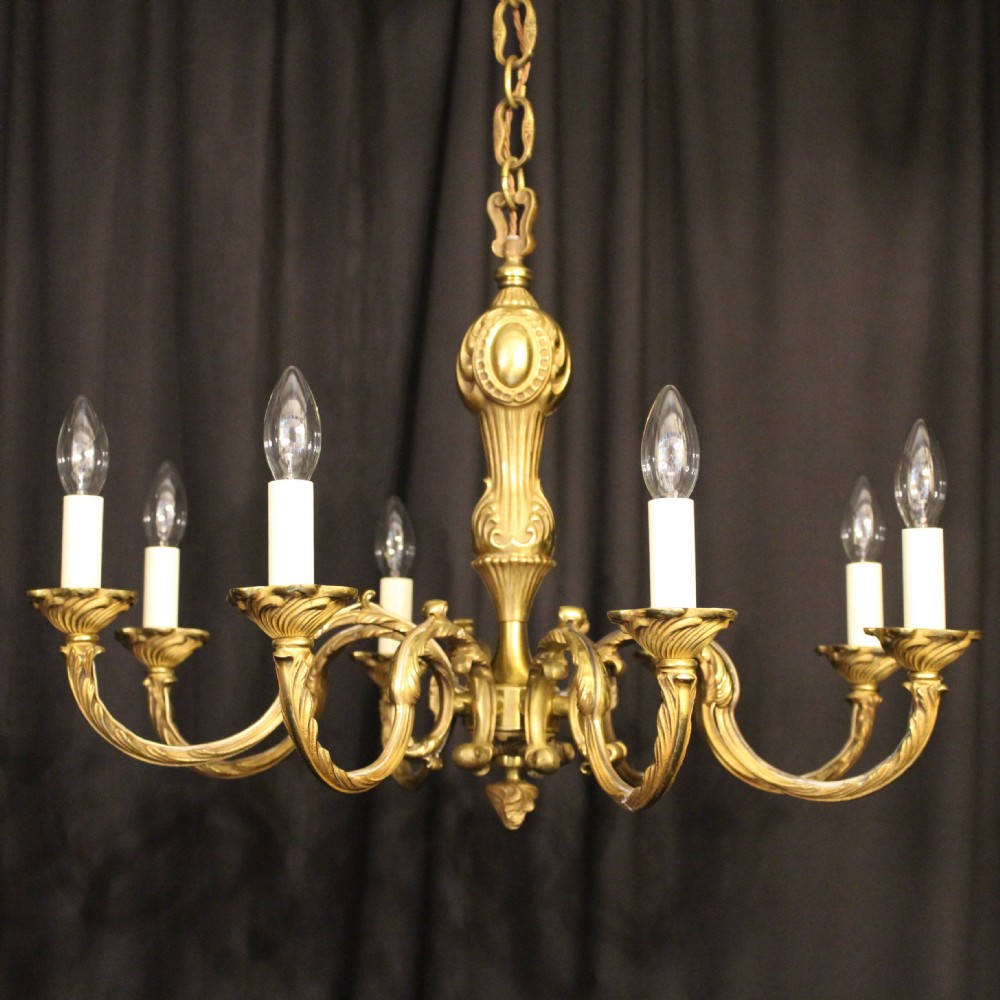 A French Gilded Cast Brass 8 Light Antique Chandelier