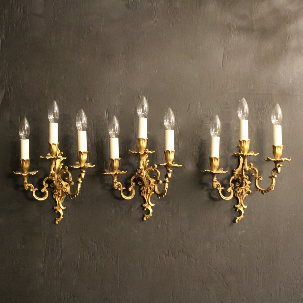 A French Set Of 3 Gilded Triple Arm Antique Wall Lights