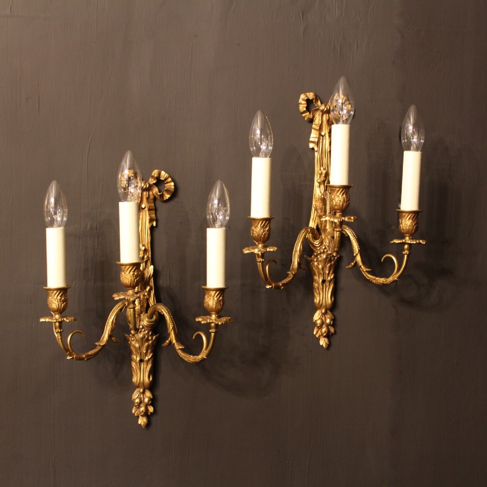 A French Pair Of Gilded Bronze Triple Arm Antique Wall Sconces