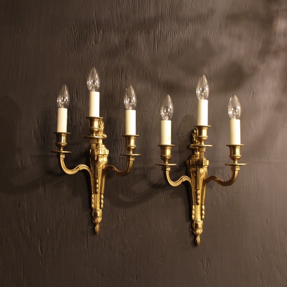 A French Pair Of Triple Arm Antique Wall Lights