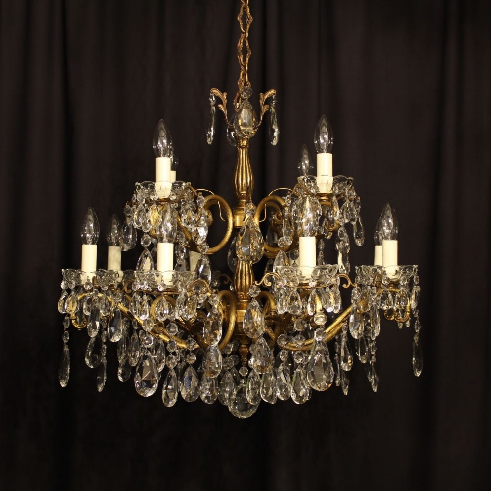 An Italian 12 Light Gilded Antique Chandelier