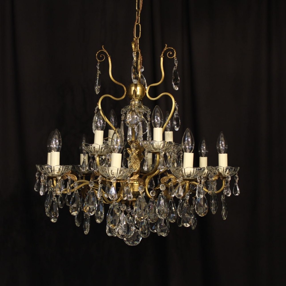 An Italian 13 Light Double Tiered Gilded Antique Chandelier