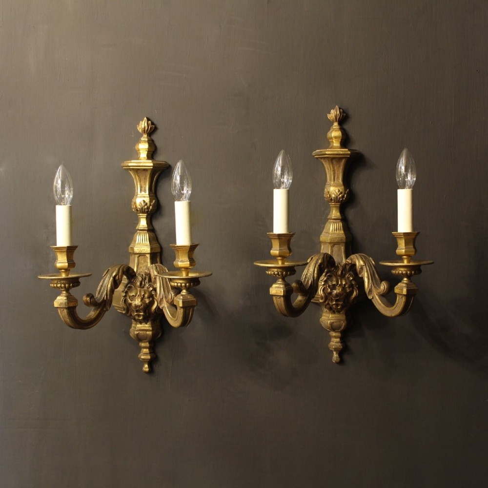 An English Pair Of Bronze Antique Wall Lights
