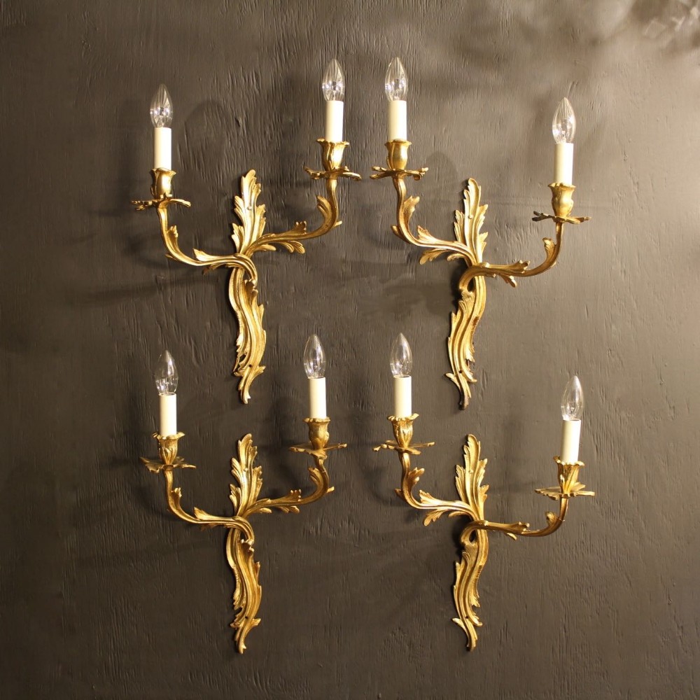 A French Set Of 4 Gilded Antique Wall Lights