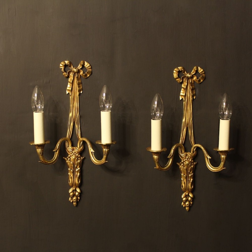 A French Pair Of Bronze Antique Wall Sconces